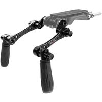 Compact black handle with ergonomic rubber grips, featuring Arri rosettes for secure attachment, designed for enhanced stability in camera setups.