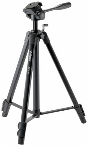 Black Velbon 10132 tripod with three adjustable legs, a quick-release plate, and a pan-and-tilt head, designed for digital and film cameras.