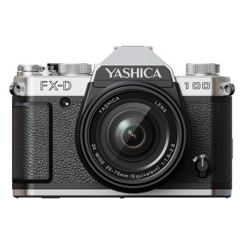 Silver and black YASHICA FX-D 100 camera with a textured grip, featuring a 13MP lens, 3x zoom capability, and a prominent YASHICA logo on the top.
