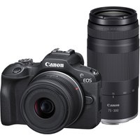 Canon EOS R100 mirrorless camera with RF-S 18-45mm lens and RF 75-300mm lens, black body, compact design.