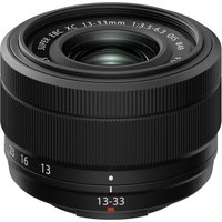 Black Fujifilm XC13-33mm F3.5-6.3 OIS lens with textured focus ring and white markings on the barrel.
