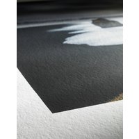 Hahnemühle Photo Rag A3, white matte paper, textured surface, close-up of corner with black and white printed image.