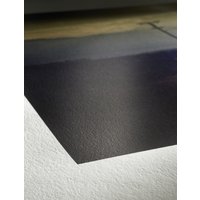 Hahnemühle Photo Rag White Satin paper with a smooth, matte texture and a subtle sheen on the surface.