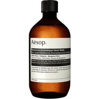 Amber bottle of Aesop Reverence Aromatique Hand Wash with screw cap and minimalist white label, 500 ml size.