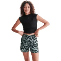 Black and green zebra print women's shorts with a high waist, worn by a model in a black sleeveless top.