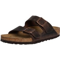Brown leather Birkenstock sandals with two adjustable straps and cork footbed.