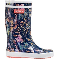 Navy blue Aigle baby rain boots with floral pattern and white trim.