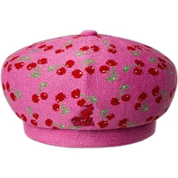 Pink Kangol Tropic Cherry Jax Beret with red cherry pattern and green accents.