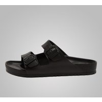 Black Birkenstock Arizona EVA sandals with dual adjustable straps and contoured footbed.
