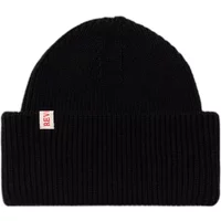 Black knitted bonnet with large fold, featuring a small red and white Revolution tag on the fold.