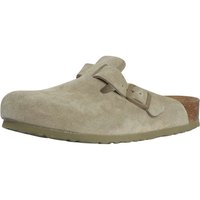 Beige Boston suede clogs by Birkenstock with adjustable strap and cork footbed.