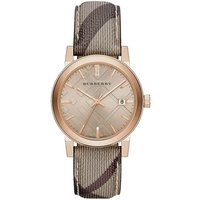 Rose gold-tone Burberry women's watch with check-patterned face and brown plaid leather strap.