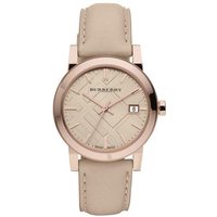 Rose gold-tone women's watch with beige check dial, date display, and beige leather strap.