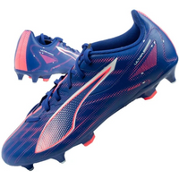 Blue soccer cleats with pink accents, white logo, and studded soles.