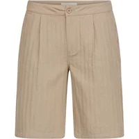 Beige chino shorts with pleated front, button closure, and knee-length cut by Blend BHMORGAN REG.