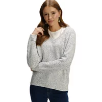 Gray knit women's sweater with V-neck and ribbed cuffs, worn by model with long brown hair.