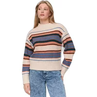 Striped sweater with multicolored horizontal bands, long sleeves, and a ribbed hem, worn by a woman with light jeans.