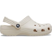 Beige Crocs Classic clog with ventilation holes, adjustable heel strap, and textured sole.