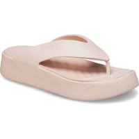 Beige Crocs platform sandals with a wide strap, open toe, and textured footbed.
