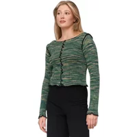 Green fine knit jumper with long sleeves, round neckline, and ruffled edges worn by a woman.