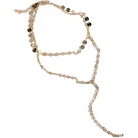 Gold flower belly chain with delicate linked floral patterns and adjustable clasp.