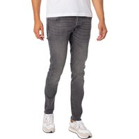 Gray slim-fit jeans by jack & jones, featuring a classic five-pocket design and subtle fading on the thighs.