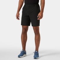 Black Helly Hansen men's shorts, 9-inch length, tailored fit, lightweight fabric, worn by model with blue sneakers.