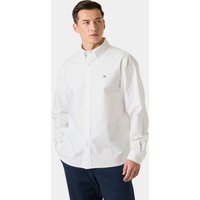 White Helly Hansen men's long sleeve shirt, button-down collar, chest logo, worn by male model.
