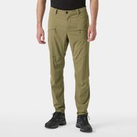 Green Helly Hansen men's trousers with zippered pockets and tapered legs, worn with black shoes and shirt.