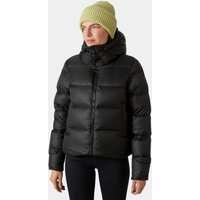 Black Helly Hansen women's down jacket with hood, quilted design, and zippered pockets, worn by a model.