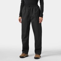 Black Helly Hansen women's rain pants, elastic waistband, loose fit, size L, worn by model with brown shoes.