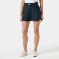 Navy women's shorts with button closure, side pockets, and belt loops, worn by a model in a white top and sneakers.