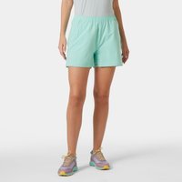 Green Helly Hansen women's shorts with elastic waistband, mid-thigh length, worn by model with light grey top.