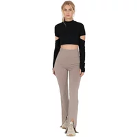 High-waisted flared trousers in taupe, featuring a sleek fit and subtle front slits, paired with a black crop top.