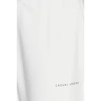 White jogging trousers by Casual Friday with subtle logo near the pocket.