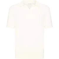 White knitted polo shirt with short sleeves and a classic collar.