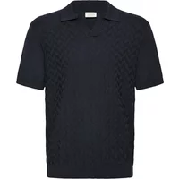 Black knitted polo shirt with short sleeves, textured pattern, and classic collar by Casual Friday CFDyrvik.