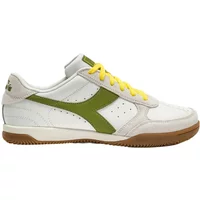 White leather Diadora Seoul Indoor shoes with green logo, yellow laces, and brown gum sole.
