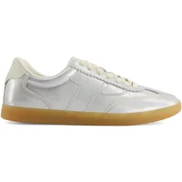 Silver leather trainers by TOMS Collins, featuring white laces and a gum sole.