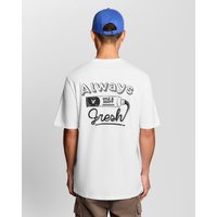 White Lyle & Scott men's T-shirt with "Always Fresh" graphic and black print on the back, worn by a person in a blue cap.