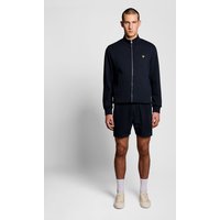 Navy cotton blend track sweat shorts with elastic waistband, subtle logo, and side pockets, worn by a model.
