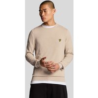 Beige Lyle & Scott cotton crew neck jumper with embroidered logo on chest, worn by a model with black pants.