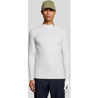 White Lyle & Scott men's golf baselayer, long-sleeve, crew neck, subtle logo on shoulder, worn by model with cap.