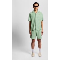 Green Lyle & Scott men's shorts with honeycomb texture, elastic waistband, and relaxed fit.