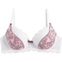 White moulded cup bra with pink leaf pattern, scalloped lace trim, and small bow accent by Pomm'Poire Hawaï.