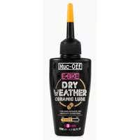 Black Muc-Off eBike Dry Lube 50ml bottle with pink and white text, yellow nozzle, and black cap.