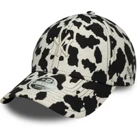 New York Yankees women's cap, black and white cow print, New Era 9Forty style, embroidered logo on front.