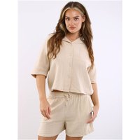 Tan co-ord shorts with elastic waistband and drawstring, paired with matching short-sleeve button-up shirt.