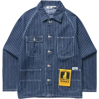 Blue striped Service Works Coverall 2.0 overshirt with button front, two chest pockets, and yellow logo tag.