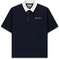 Navy oversized polo shirt by Guess with white collar and embroidered logo on chest.